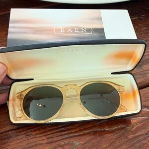 RAEN Remmy Sunglasses - Champagne Crystal and Green